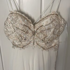 Beautiful White maxi dress with sequins on top